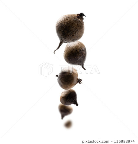 Ripe beets levitate on a white background Ripe beets levitate on a white background 136988974