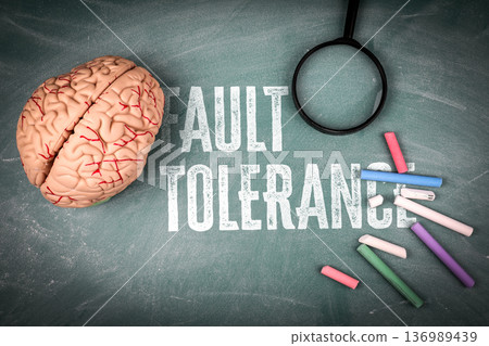 FAULT TOLERANCE Concept With Brain Model And Analysis Tools On Chalkboard 136989439