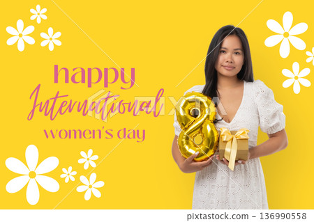 Young woman holds balloons and a gift for Women's Day celebration Young woman holds balloons and a gift for Women's Day celebration 136990558
