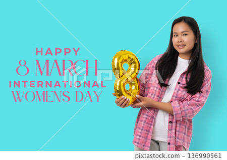 Young woman holds an 8 balloon for Women's Day Young woman holds an 8 balloon for Women's Day 136990561