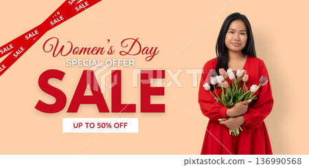 Woman holds flowers and promotes a sale for Women's Day Woman holds flowers and promotes a sale for Women's Day 136990568