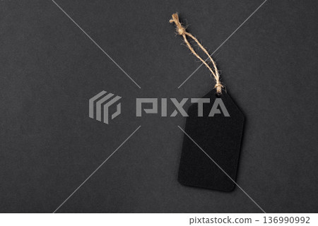 Empty black tag on black background Empty black tag on black background 136990992