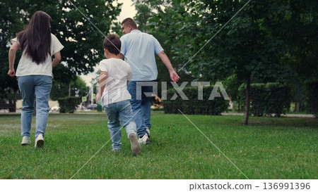 family jogging, group people running feet sidewalk park, child play, teamwork, group people run, happy woman motherhood, parents with child boy son running merrily laughing, man woman loving son family jogging, group people running feet sidewalk park, child play, teamwork, group people run, happy woman motherhood, parents with child boy son running merrily laughing, man woman loving son 136991396