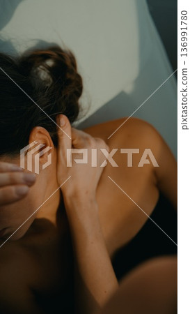 Practitioner employs targeted tension alleviation techniques 136991780