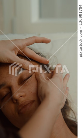 Restorative facial therapy soothes tired skin and enhances glow Restorative facial therapy soothes tired skin and enhances glow 136991784