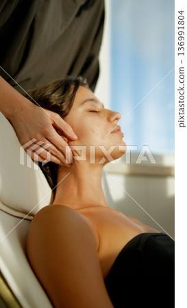 Therapy for neck. Patient undergoes targeted neck and chest treatment 136991804