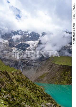 Emerald waters of Laguna Humantay surrounded by Andean mountains in Peru 136992666
