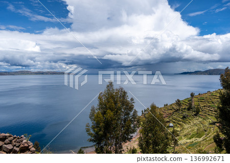 Scenic view of nature and terraced fields on Taquile Island, Peru 136992671