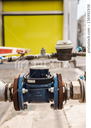 Water meter and pipeline control system near parking barrier in rome italy Water meter and pipeline control system near parking barrier in rome italy 136992936