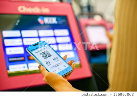 Present your boarding pass on your smartphone. Photo courtesy of Kansai International Airport (KIX) 136993068