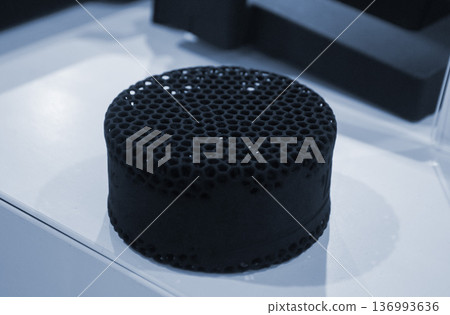 Object printed on 3D printer. Model printed on 3D printer from thermoplastic polyurethane. Prototype printed on 3D printer from powder with thermoplastic polyurethane. TPU technology. Printing concept Object printed on 3D printer. Model printed on 3D printer from thermoplastic polyurethane. Prototype printed on 3D printer from powder with thermoplastic polyurethane. TPU technology. Printing concept 136993636