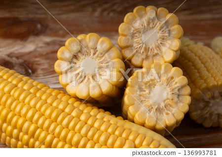Sweet corn ears closeup. Fresh maize cob macro texture, autumn sweetcorn, corncob close up Sweet corn ears closeup. Fresh maize cob macro texture, autumn sweetcorn, corncob close up 136993781