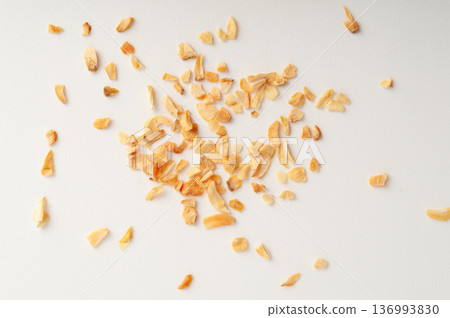 Dry Garlic Slices, Crispy Fried Cloves Pile Closeup, Roasted Grilled Garlic Flakes, Clove Chip Group Dry Garlic Slices, Crispy Fried Cloves Pile Closeup, Roasted Grilled Garlic Flakes, Clove Chip Group 136993830