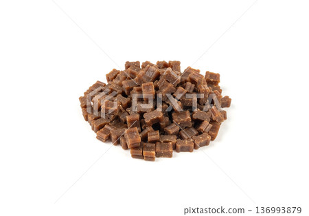 Mini bone-shaped pet food, small dogs crunchy treats, flavored brown dry kibble, canine food 136993879
