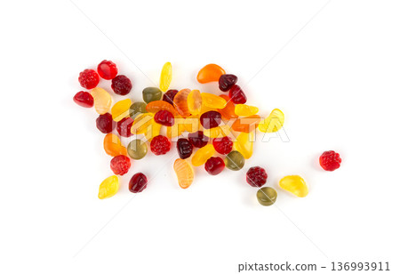 Fruit gummy candy pile isolated, vegan chewing marmalade pills, jelly gumdrops heap Fruit gummy candy pile isolated, vegan chewing marmalade pills, jelly gumdrops heap 136993911