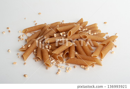 Raw Brown Pasta, Wholegrain Penne, Dry Whole Grain Noodle, Raw Spelt Macaroni, Healthy Italy Food 136993921