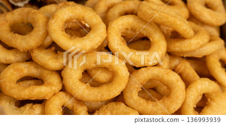 Calamari rings pattern, deep fry seafood textured background 136993939