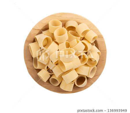 Raw Calamarata Big Pasta Isolated, Homemade Dry Macaroni, Italian Raw Round Noodle 136993949