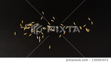 Raw orzo pasta, risoni or kritharaki pile 136993972