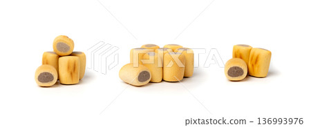 Filled dog biscuits, crackers isolated, soft crunchy pet treats pile, flavored small canine cookie Filled dog biscuits, crackers isolated, soft crunchy pet treats pile, flavored small canine cookie 136993976