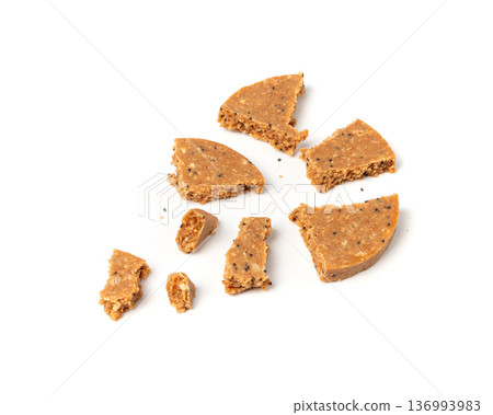 Protein cookie isolated, broken round energy snack with peanuts, chicory fibre 136993983