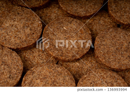 Party pumpernickel, whole grain rye bread rounds 136993994