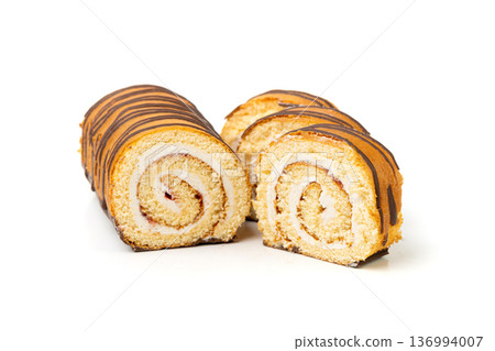 Swiss Roll, Round Sponge Cake Isolated, Sliced Rolled Vanilla Biscuit with Jam Filling Swiss Roll, Round Sponge Cake Isolated, Sliced Rolled Vanilla Biscuit with Jam Filling 136994007