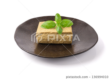 Tofu Cheese Isolated, Smoked Vegan Cheese Slice, Sliced Soya Bean Curd, Soy Protein or TSP 136994010