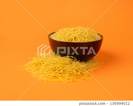Raw vermicelli, gold soup pasta, small homemade noodles, thin Italy macaroni 136994012