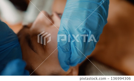 Relaxing Jade Facial Massage for Woman with Skilled Professional Relaxing Jade Facial Massage for Woman with Skilled Professional 136994306