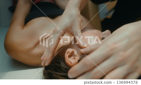 Soothing spa session focusing on lymphatic drainage around face and neck Soothing spa session focusing on lymphatic drainage around face and neck 136994378