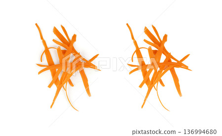Thin carrot strips isolated. Carrot slices for vegetable salad Thin carrot strips isolated. Carrot slices for vegetable salad 136994680