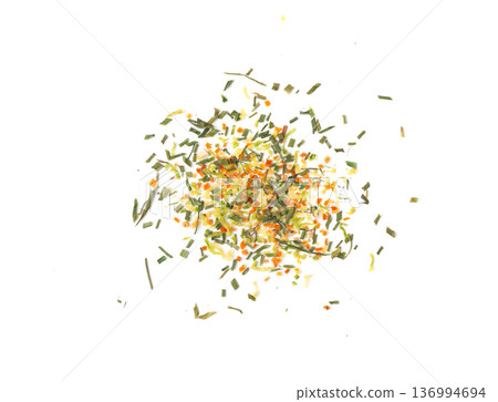 Dried vegetable mix isolated. Dehydrated greens, onion, carrot pieces, seasoning chips, flakes Dried vegetable mix isolated. Dehydrated greens, onion, carrot pieces, seasoning chips, flakes 136994694