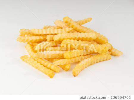 Frozen potato sticks isolated, iced finger chips 136994705