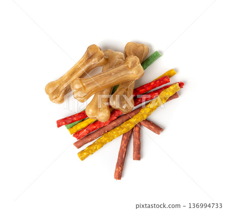 Rawhide bones, collagen dog chew food, pressed dry kibble, natural long-lasting canine treats Rawhide bones, collagen dog chew food, pressed dry kibble, natural long-lasting canine treats 136994733