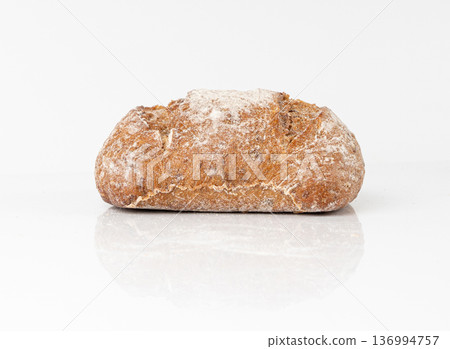 Brown rye bun, square gluten free bread, whole grain healthy breakfast bread Brown rye bun, square gluten free bread, whole grain healthy breakfast bread 136994757