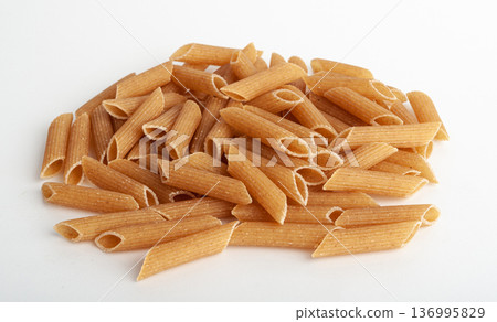 Raw Brown Pasta, Wholegrain Penne, Dry Whole Grain Noodle, Raw Spelt Macaroni, Healthy Italy Food 136995829