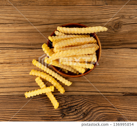 Frozen potato sticks, iced finger chips 136995854