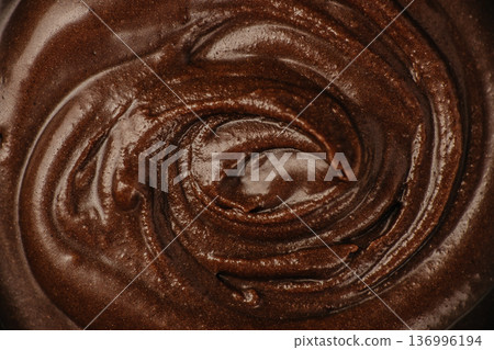 Chocolate cream swirl texture background 136996194