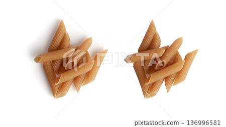 Raw Brown Pasta, Wholegrain Penne, Dry Whole Grain Noodle, Raw Spelt Macaroni, Healthy Italy Food Raw Brown Pasta, Wholegrain Penne, Dry Whole Grain Noodle, Raw Spelt Macaroni, Healthy Italy Food 136996581