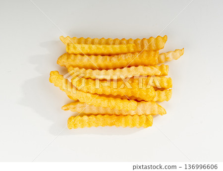 Frozen potato sticks isolated, iced finger chips 136996606