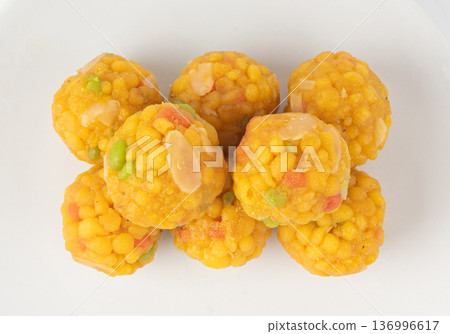 Ladoo, laddu or bundi laddoo is Indian sweet Diwali food. This is boondi ladoo balls Ladoo, laddu or bundi laddoo is Indian sweet Diwali food. This is boondi ladoo balls 136996617