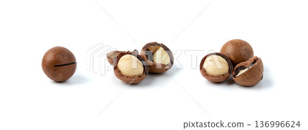Macadamia nuts isolated. Natural raw peeled macadamia seeds and shells 136996624
