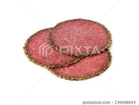 Pepper salami cuts isolated, thin sausage slices. Sliced dry chorizo, sausages round pieces Pepper salami cuts isolated, thin sausage slices. Sliced dry chorizo, sausages round pieces 136996654