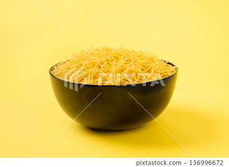 Raw vermicelli, gold soup pasta, small homemade noodles, thin Italy macaroni Raw vermicelli, gold soup pasta, small homemade noodles, thin Italy macaroni 136996672