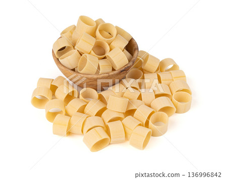 Raw Calamarata Big Pasta Isolated, Homemade Dry Macaroni, Italian Raw Round Noodle 136996842