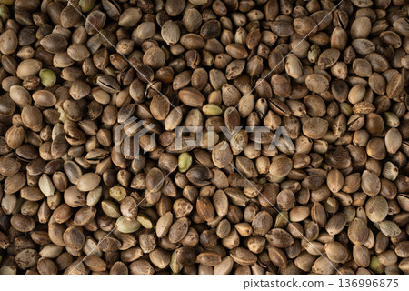 Hemp seeds pile texture background 136996875