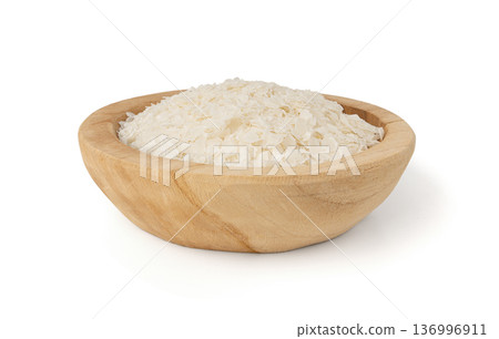 Raw flattened rice isolated. Dry rice flakes or poha, Indian breakfast food 136996911