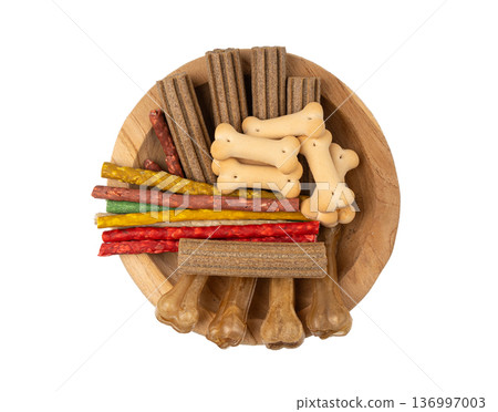 Assorted dog kibble, many canine food, different color dry pet food mix, various dog snack pile 136997003