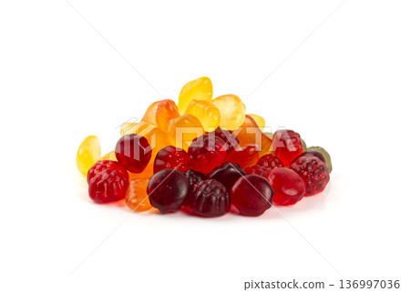 Fruit gummy candy pile isolated, vegan chewing marmalade pills, jelly gumdrops heap Fruit gummy candy pile isolated, vegan chewing marmalade pills, jelly gumdrops heap 136997036